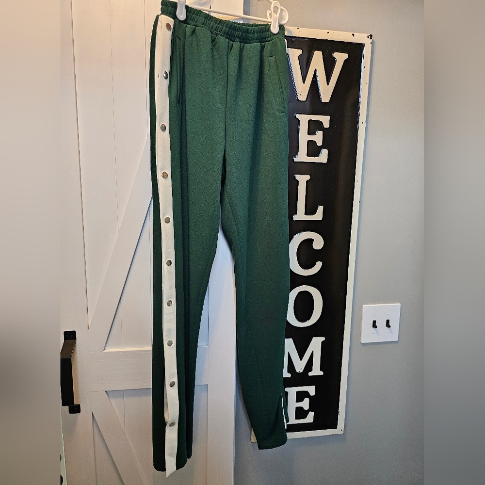 Fashion Nova green and white pants with a side snap.